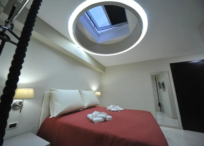 Couette-café Gatto Bianco House 4*